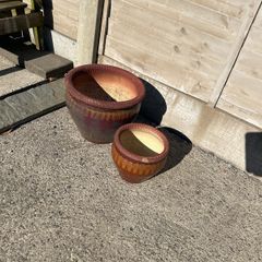 Pair of brown glazed garden pots