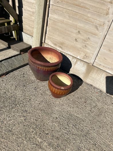 Pair of brown glazed garden pots