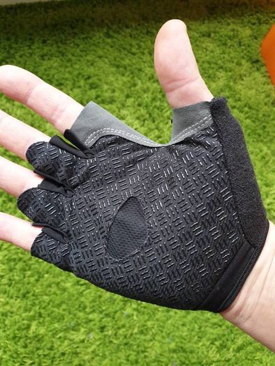 Gym gloves. Fingerless gloves. Cycling gloves. Work gloves. Carpenter gloves. Weightlifting. Workout.  Fitness.  Bodybuilding