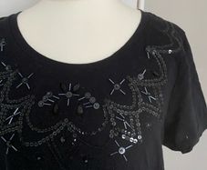 New Black Top with Sequins on neckline, size 12