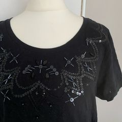New Black Top with Sequins on neckline, size 12