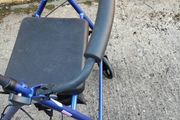 rollator with seat and storage pouch