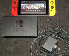 Nintendo Switch + games + 2 joy cons