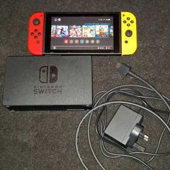 Nintendo Switch + games + 2 joy cons
