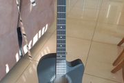 Black acoustic guitar