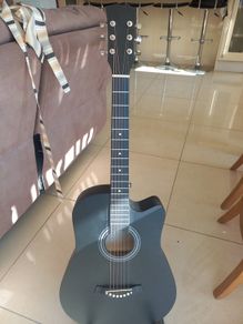 Black acoustic guitar