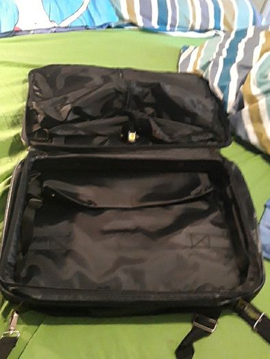 Nescafe shoulder cross bag. Travelling bag with suit case.