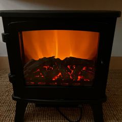 Freestanding log flame effect stove