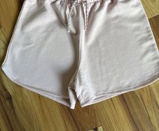 Girls powder pink shorts age 8-9 excellent condition!