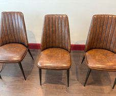 Brown leather dining chairs