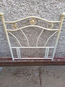 Metal single bed head frame.
