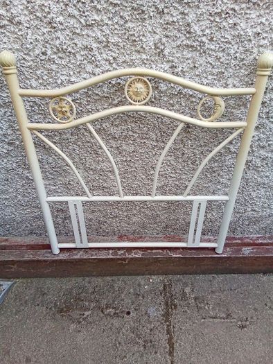 Metal single bed head frame.