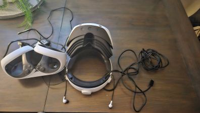 Ps5 VR Headset and hand controls with charging port.