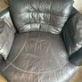 Large circular leather swivel chair and foot stool Image 2