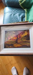 Framed under glass oil panting on board of land scape signed M.M KENNA