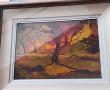 Framed under glass oil panting on board of land scape signed M.M KENNA