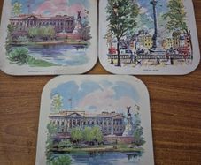 Set of 3 Vintage Metal Fronted Table Mats Decorated With Illustrations Of Places in England