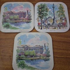 Set of 3 Vintage Metal Fronted Table Mats Decorated With Illustrations Of Places in England