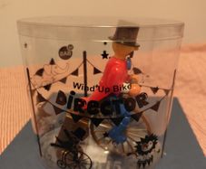 Wind Up Circus Director on Penny Farthing Bicycle