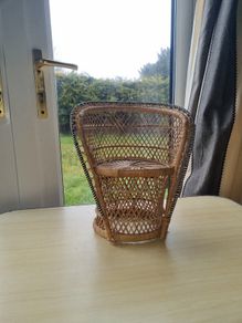 Vintage miniature wicker armchair in the "peacock" style