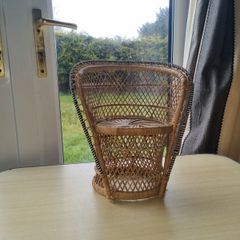 Vintage miniature wicker armchair in the "peacock" style
