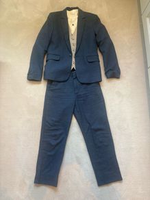 Beautiful boys blue linen suit with shirt and waistcoat