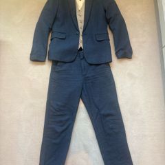 Beautiful boys blue linen suit with shirt and waistcoat