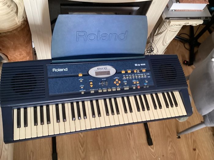 EM-10 Creative Keyboard with music stand and keyboard stand in excellent working condition for quick sale
