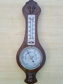 Classic wall-mounted aneroid barometer