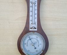 Classic wall-mounted aneroid barometer