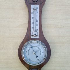 Classic wall-mounted aneroid barometer