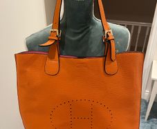 Orange bags selling together