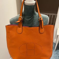 Orange bags selling together