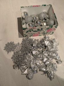 A set of silver Christmas decorations