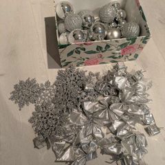 A set of silver Christmas decorations