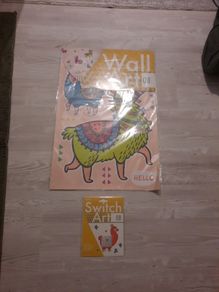 funky llama wall art and light switch art