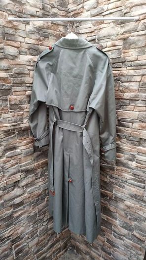 Vintage Nuage ladies trenchcoat Approximately late 90s early 00s Size 10 on label The colour is a pale bluey grey with brown buttons It's got an inner lining that can be removed