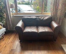 brown genuine leather two seater sofa