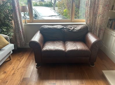 brown genuine leather two seater sofa