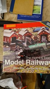 The Hornby Book Of Model Railways. By Chris Ellis. Forwarded By James May. Large Volume Paperback In Good Condition.