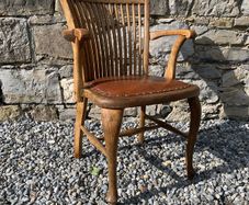 Edwardian Arts and Crafts Oak Armchair.
