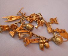 22 KT gold x 18 charm's and bracelet