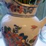 Faux Flowers in Pretty Jug. Image 5