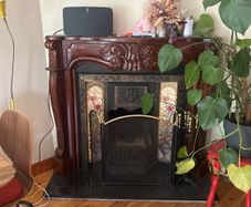 Ornate mahogany fire surround/mantle