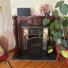 Ornate mahogany fire surround/mantle