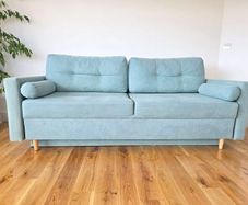 Sofa Bed. Sleeping fuction with Storage container. Comfortable sleep for your guests. High quality materials. Impeccable condition. Decorative pillows included.