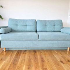 Sofa Bed. Sleeping fuction with Storage container. Comfortable sleep for your guests. High quality materials. Impeccable condition. Decorative pillows included.