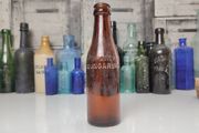 401 - Vintage Thos Power Dungarvan Dark Amber Glass Collectible Decorative Bottle