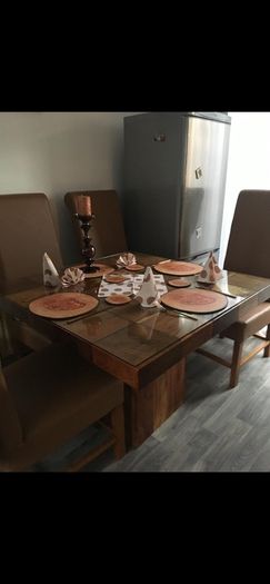Dining tables with 4 chairs. Glass panel for top table