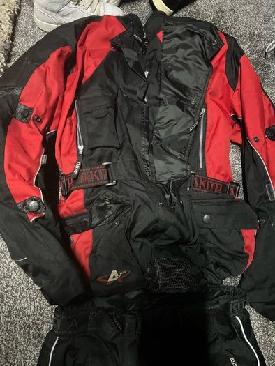 motorbike suit gloves and helmet